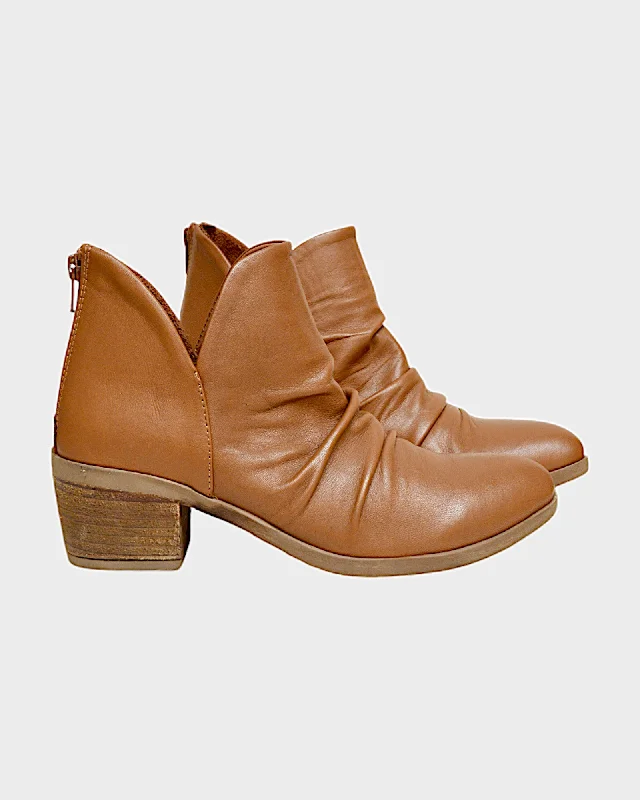 Boots with subtle glow hues -Bueno Cori